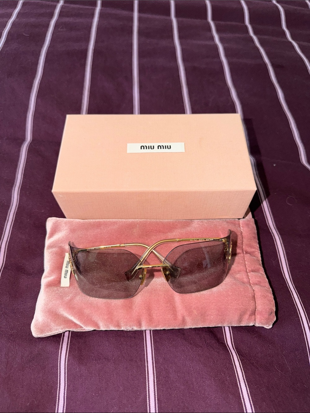 Miu Miu Gold Frame Sunglasses with Grey Lenses